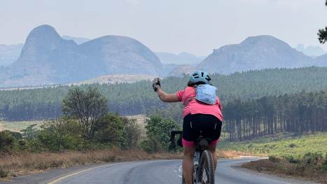 2025 Cape to Kili Reviews: "An Incredible Adventure!" Nicola-thumbs-up-on-the-mountain-road-of-Tanzania