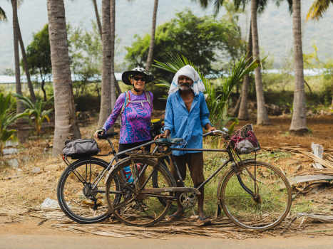 Evelyn Jacula Holland posing with a villager near Madurai