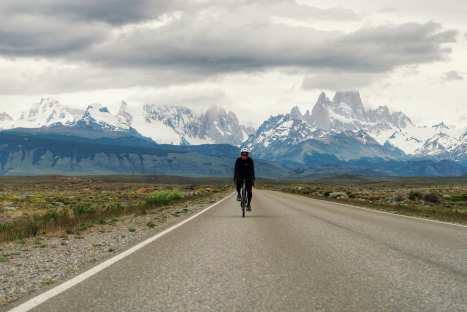 South American Epic Cycling Expedition Documentary Film Screening In Montreal Jerry-with-a-Mount-Fitzroy-backdrop-scaled