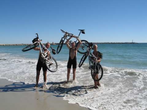 TDA riders celebrate the finish in Cape Town - South Africa