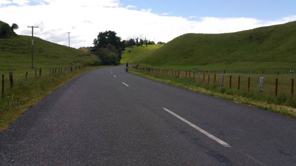 Blog 12 - 05 - Rider cycling along rolling hills