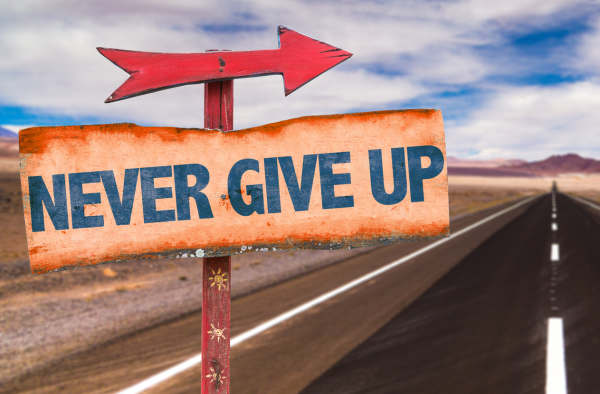 Never Give Up sign