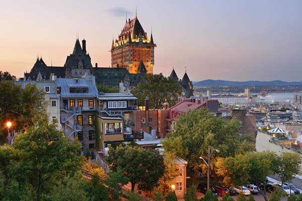 Quebec City skyline with Chateau Frontenac at sunset viewed from hill