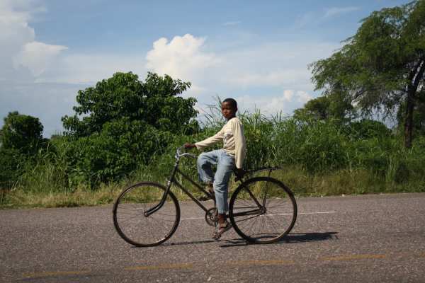 local boy on bike, Malawi