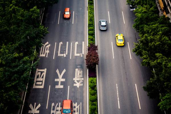 aerial view of road thaffic,chongqing china.Chinese characters on road are all traffic roadmarking.