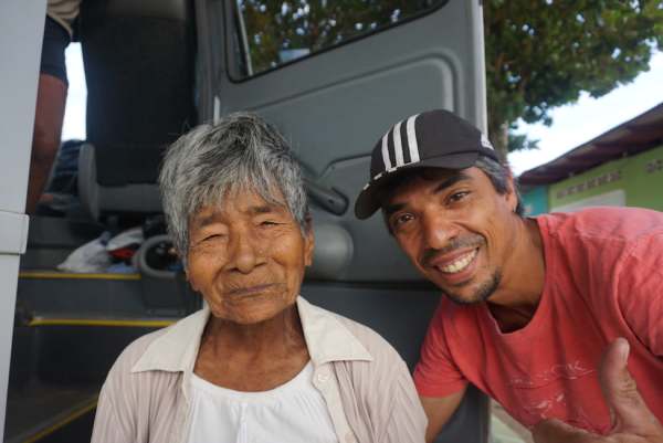 Luiz and a local woman named Veronica who hitched a ride to her village