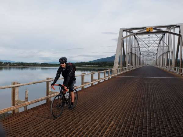 New sectional rider, Chris, crosses the Teslin river on an early morning.