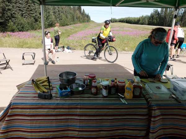 Wayne departs lunch as Francine makes a sandwich.
