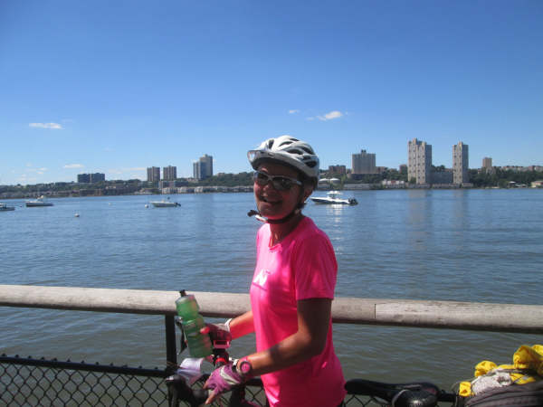 Carol in cycling in NY on the Hudson