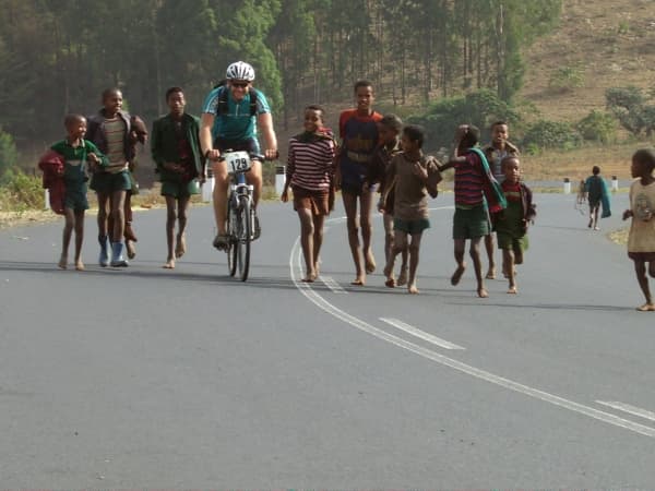 Copy of TDA rider with Ethiopian children