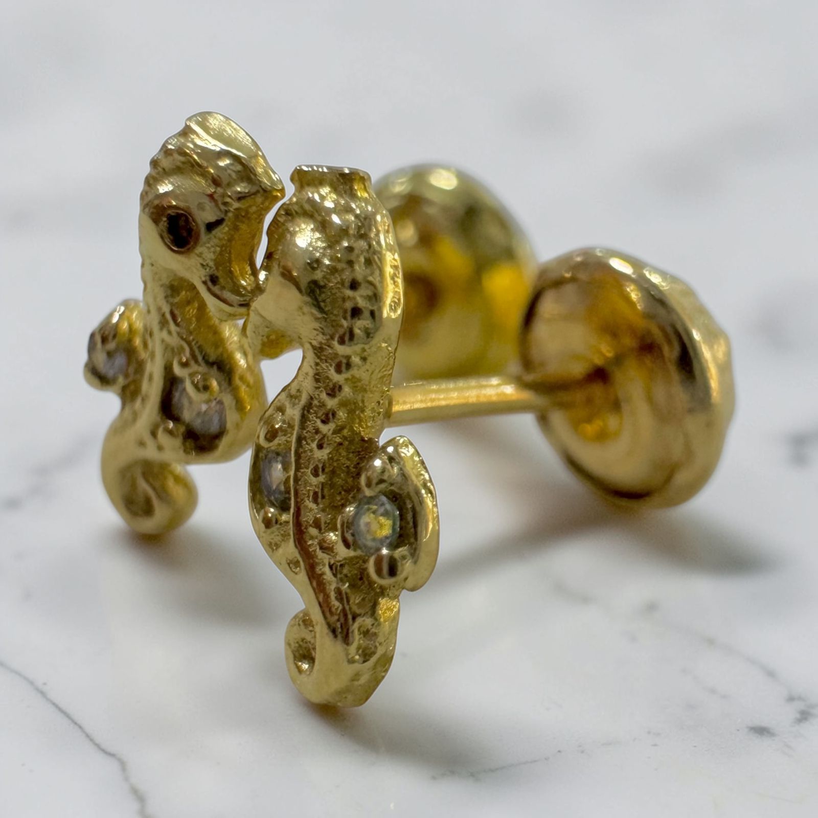 TOPO ROSCA ORO18K/CABALLITOS