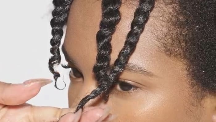 close-up of woman with twist-outs