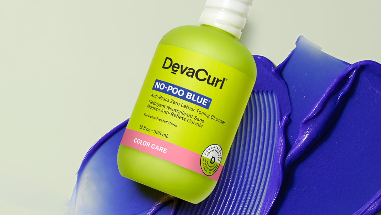 bottle of no-poo blue on top of blue goop
