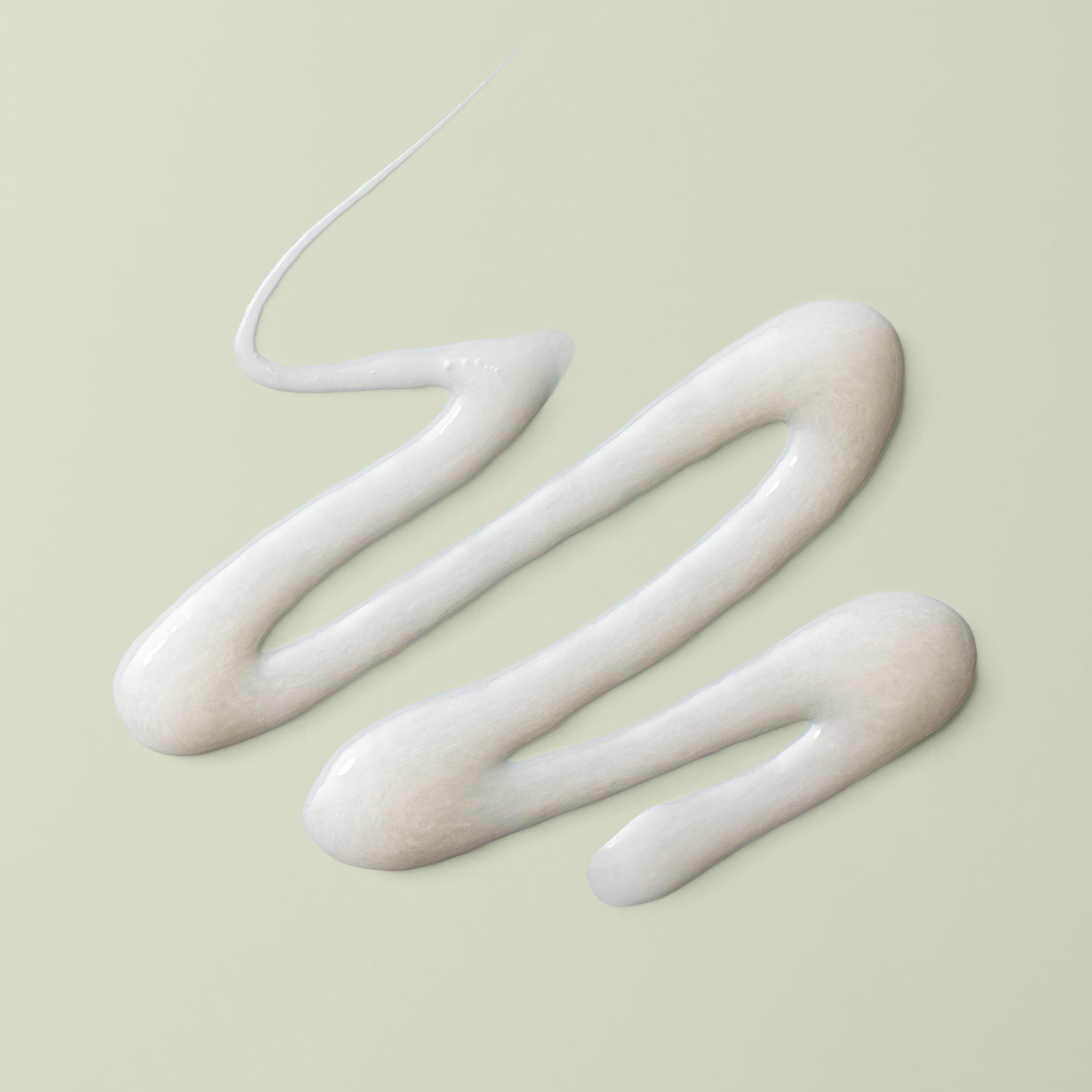 beige goop on sage background