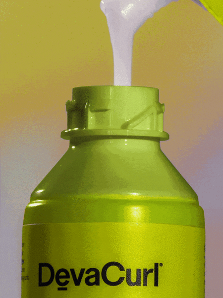 Mist of Wonders refill pouring in bottle