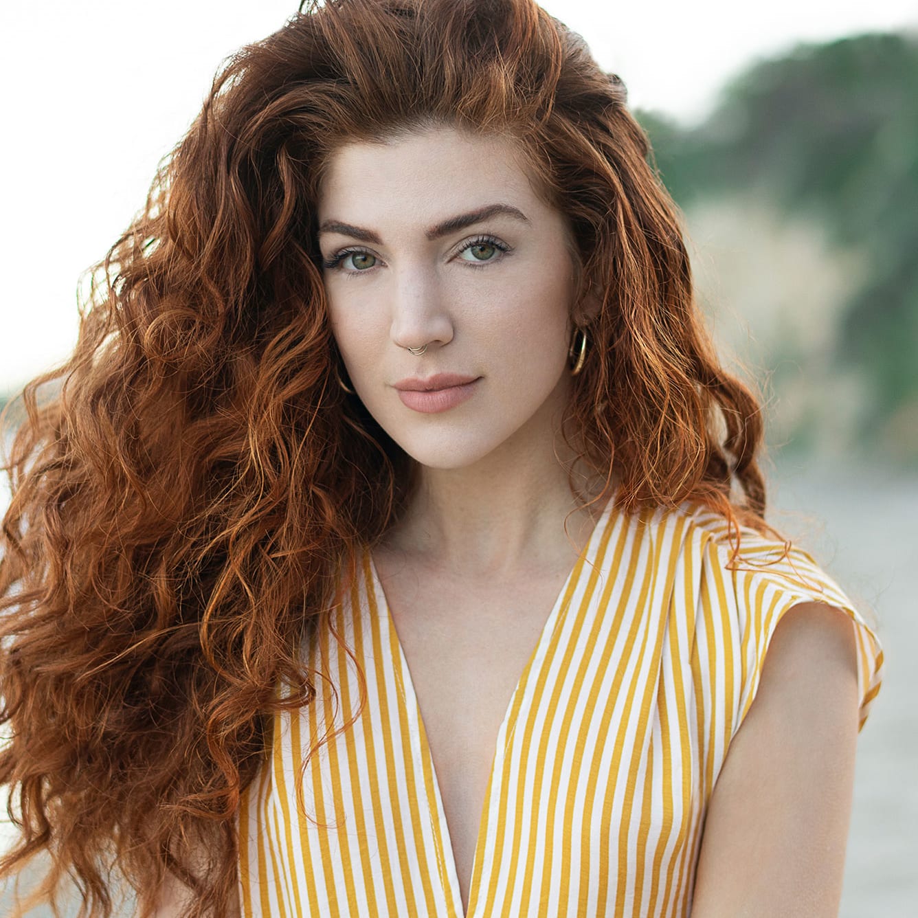 woman with long red wavy hair