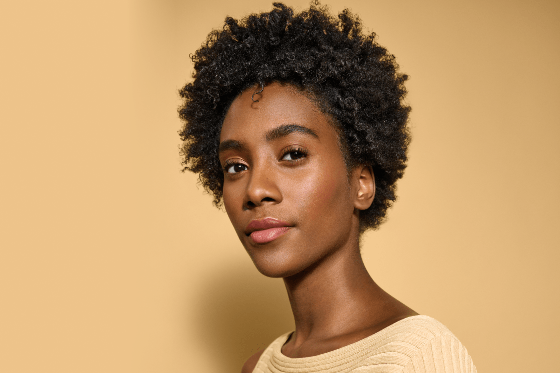 woman with short coily hair