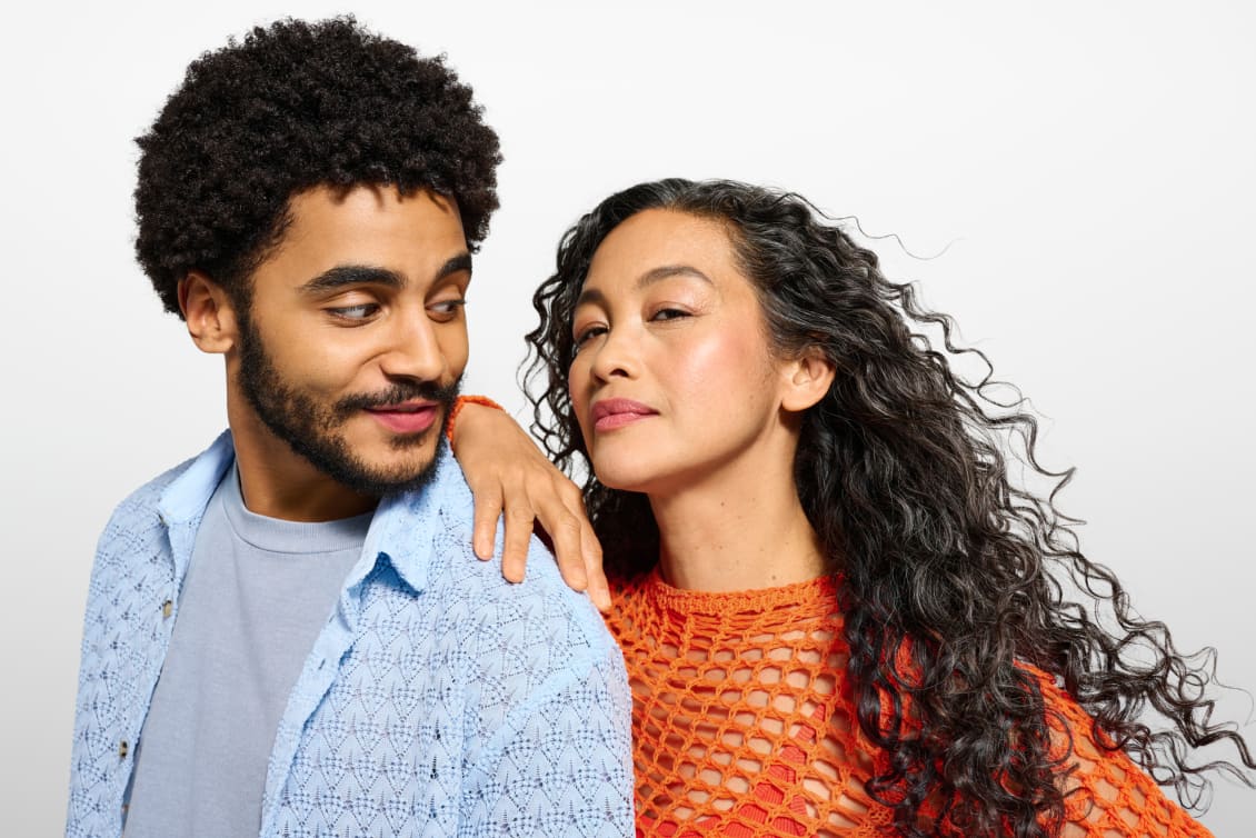 man and woman with curly hair