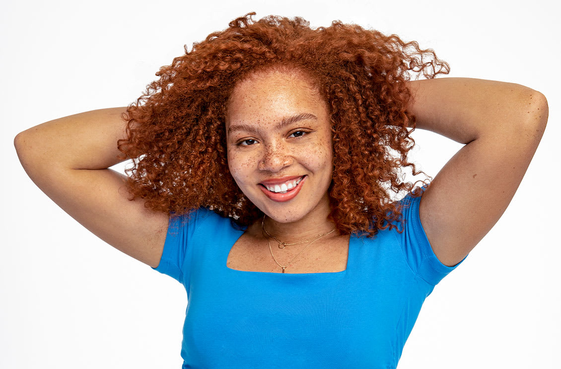 woman with red curly hair