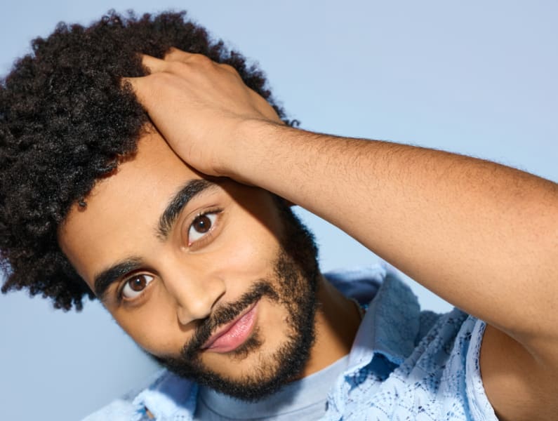 Man with coarse, curly hair