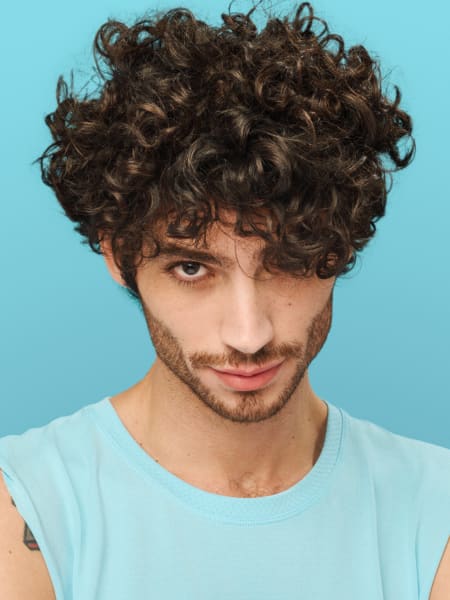 Man with short curly hair