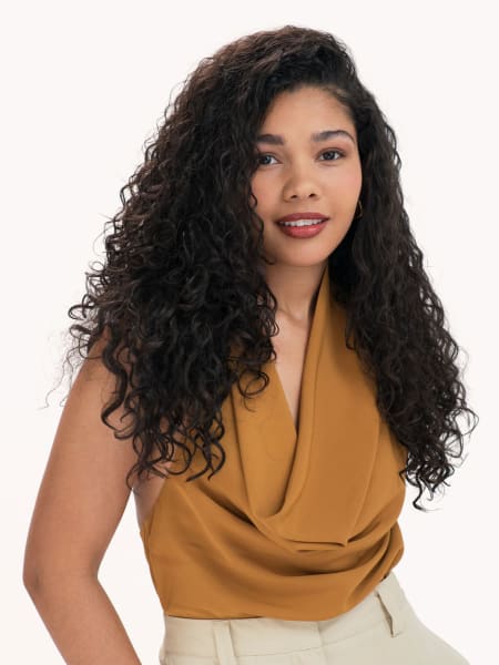 woman with long thick curly hair