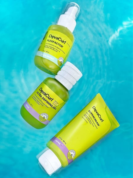 FlexFactor and Ultra Defining Gel bottles and SuperCream tube in pool