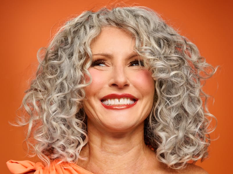 Woman with silver wavy hair