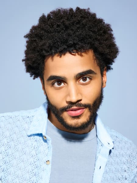 Man with curly, coarse hair