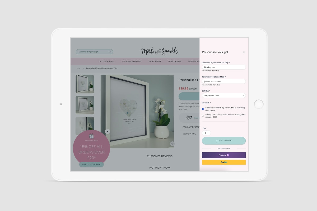 An iPad displaying Made with Love and Sparkles Hyvä M2 site. With the integration of Stripe compat module developed by Develo