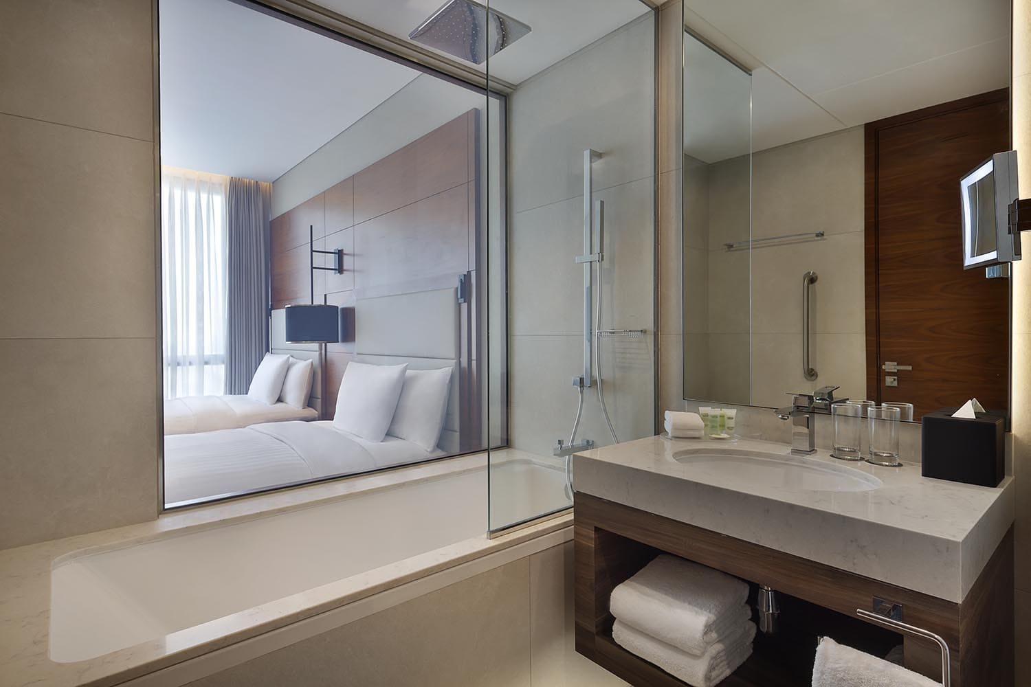Twin bed bathroom with sink window open