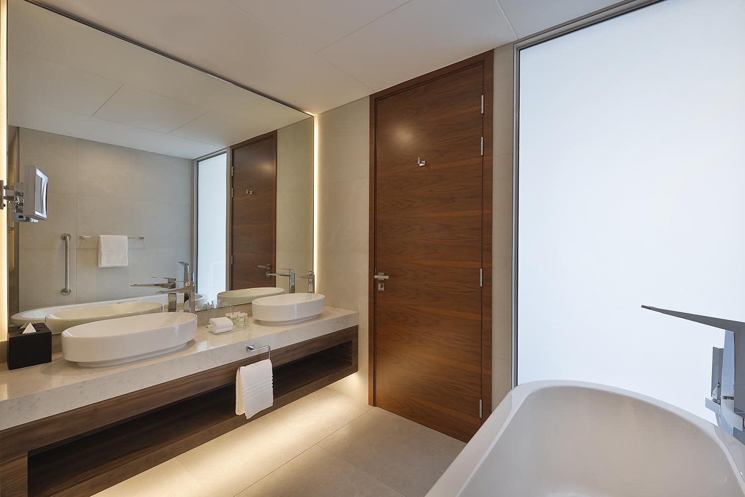 Suite bathroom with two sinks
