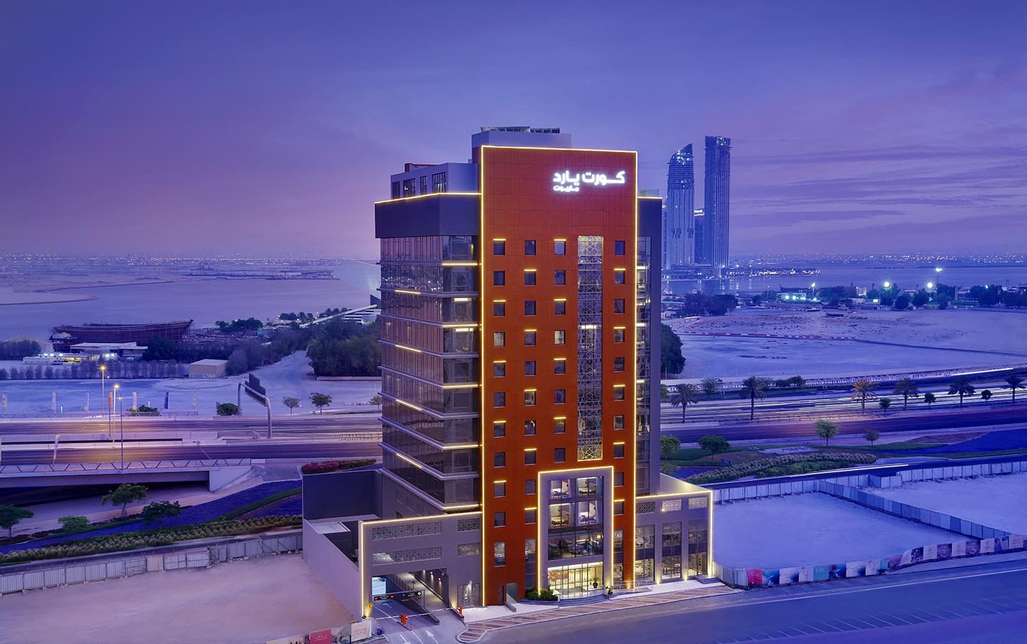 View of hotel exterior during evening