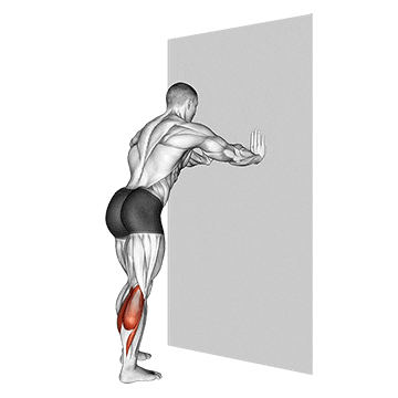 calf stretch with hands against wall demonstration
