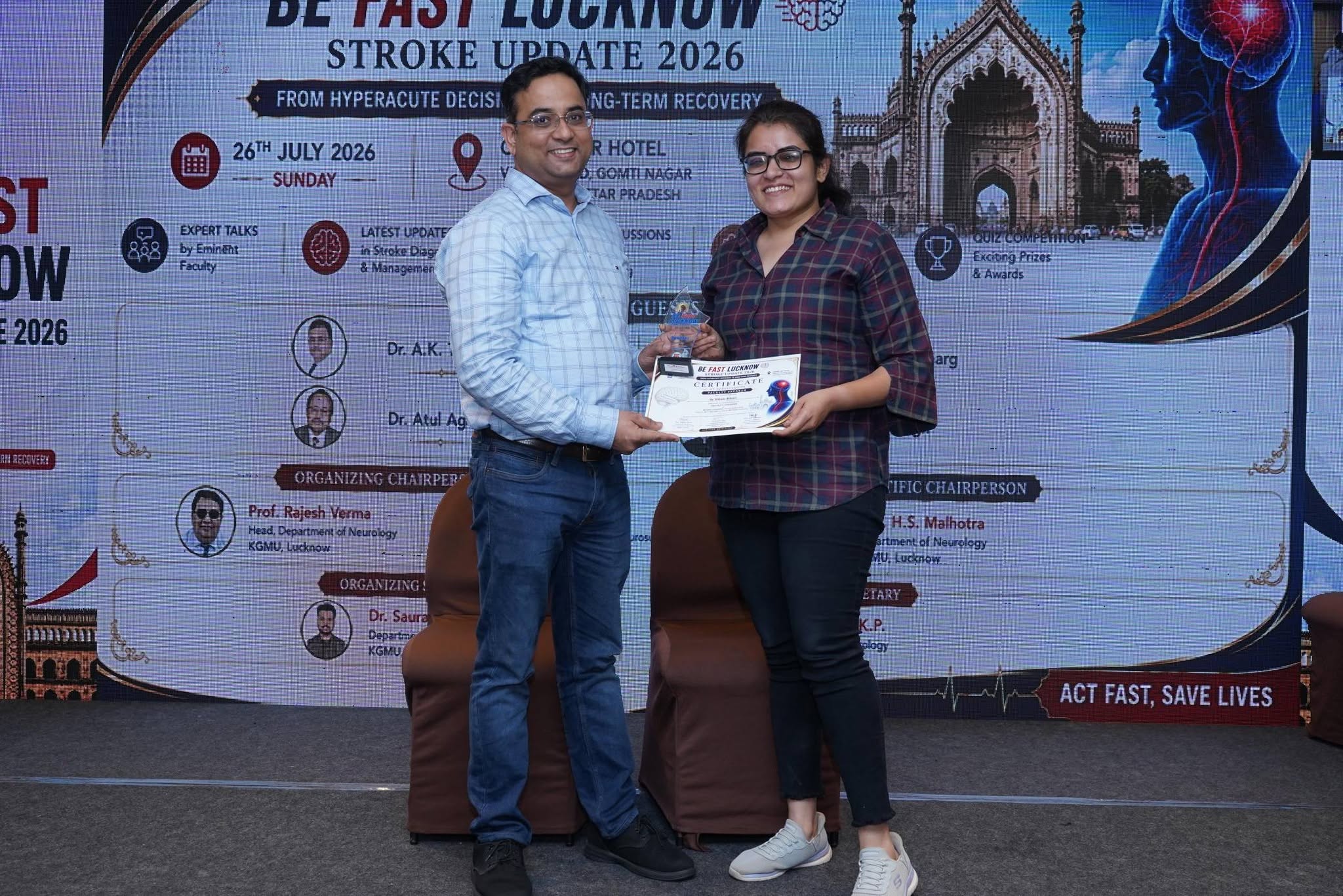 Dr. Ritwiz Bihari receiving an award and certificate at the BE FAST Lucknow Stroke Update 2026