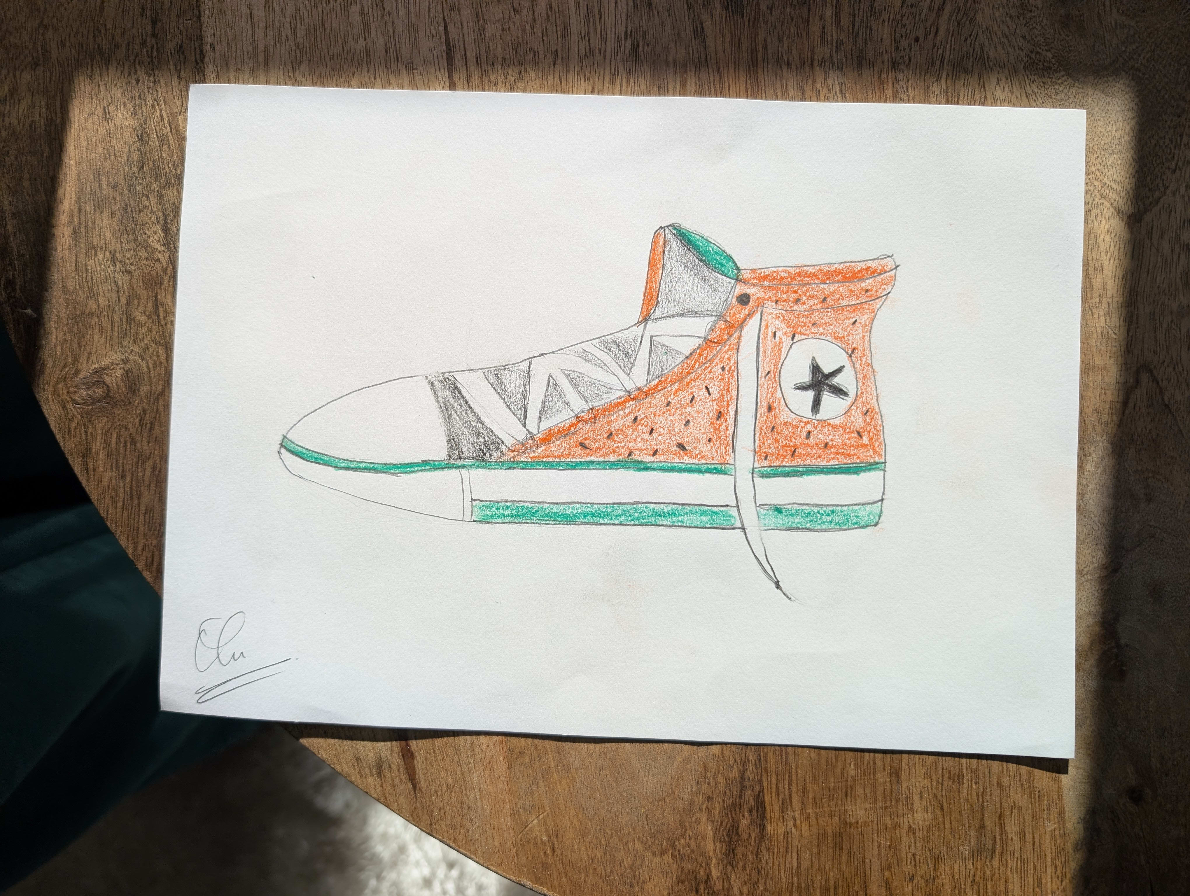 Olu's drawing of an unlaced shoe at draw la-la. Well, Olu doesn't know how to draw an untied shoelace either.