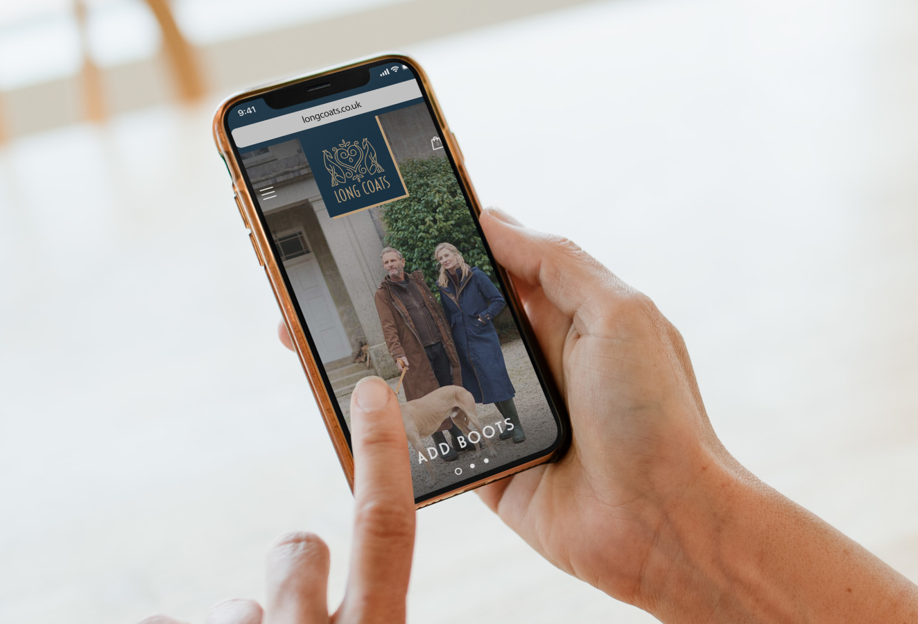 Long coats website on a mobile phone