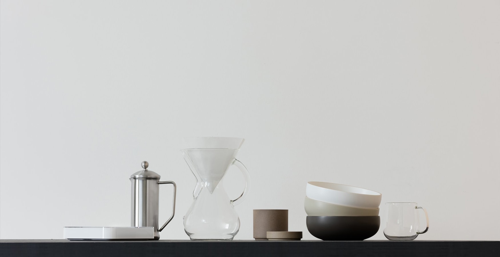 Origin coffee filtered, with mugs, pots and bowls