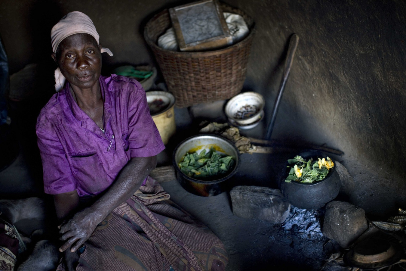 DLP image of a woman in Malawi in her house