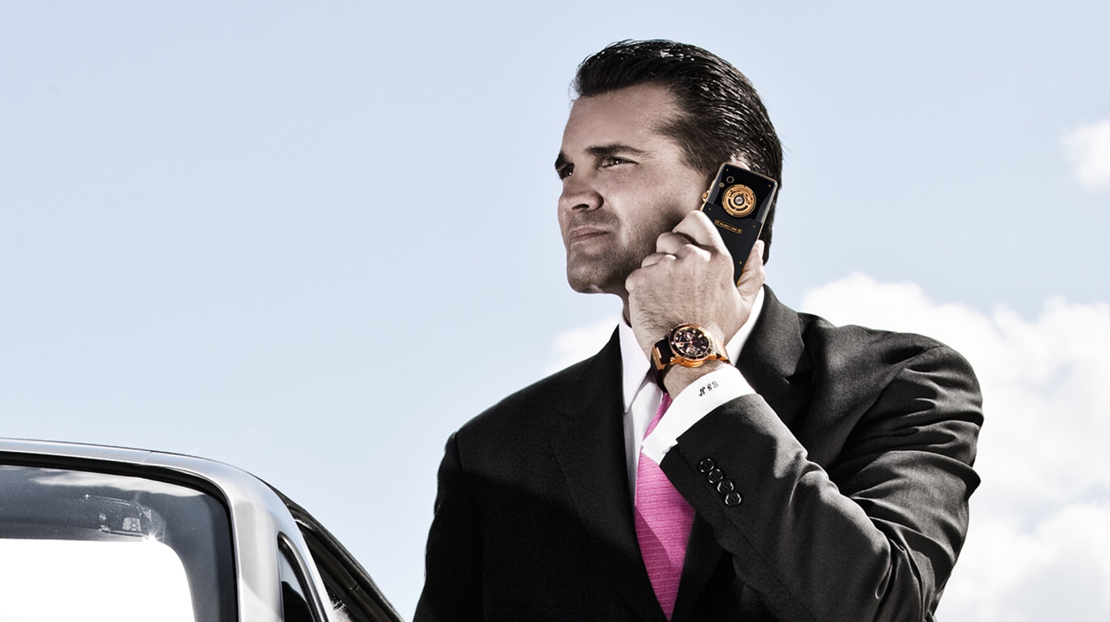 Man holding a Ulysse Nardin cell phone