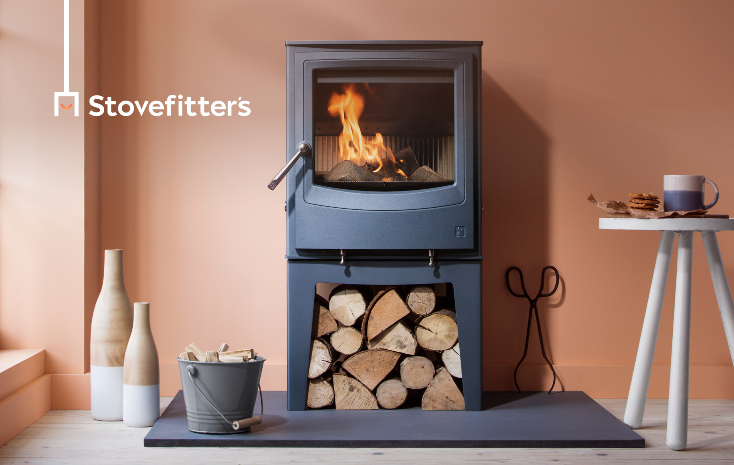 Stove with Stovefitters logo on it