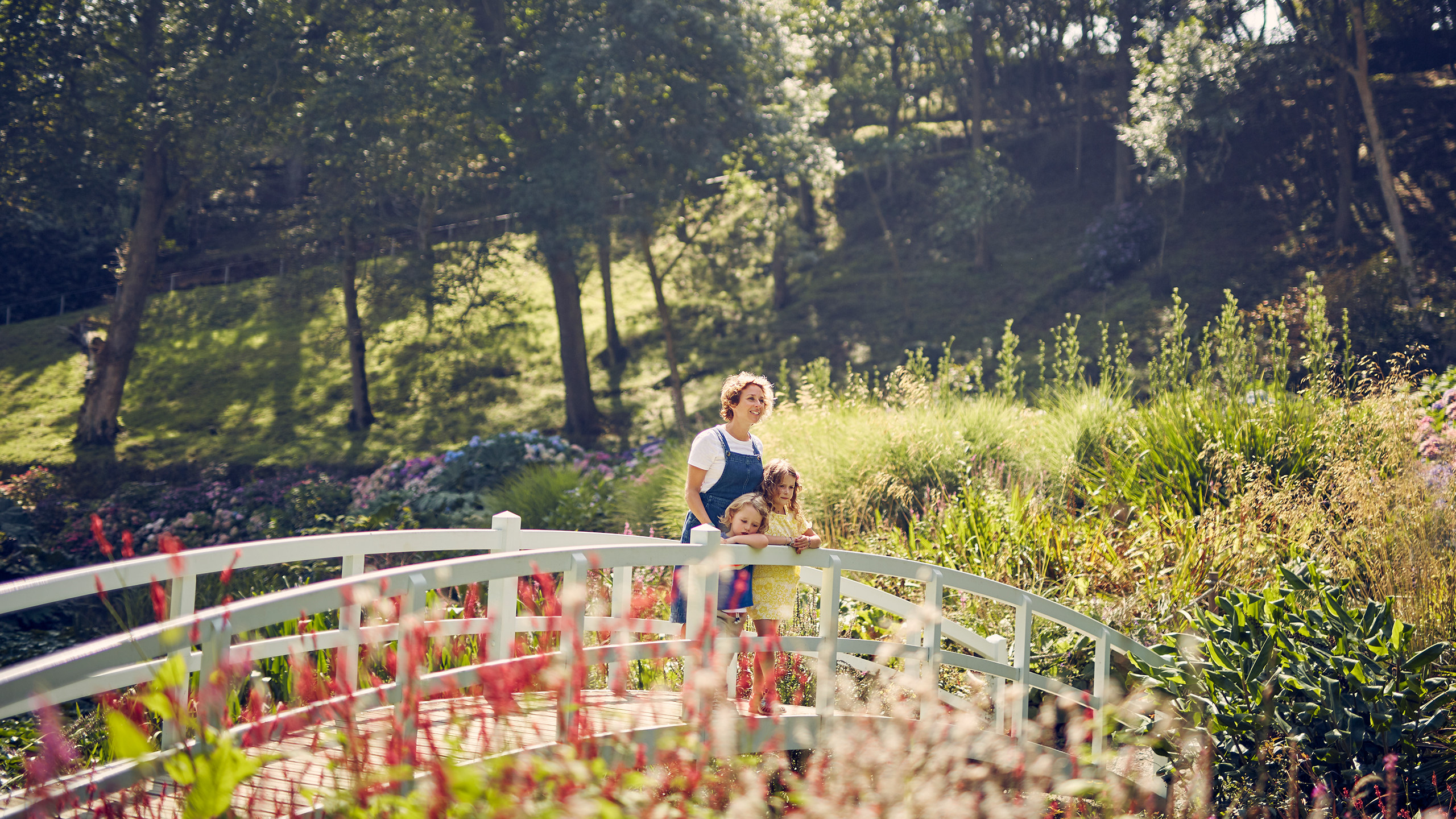 Photograph of a happy family at Trebah Garden Cornwall