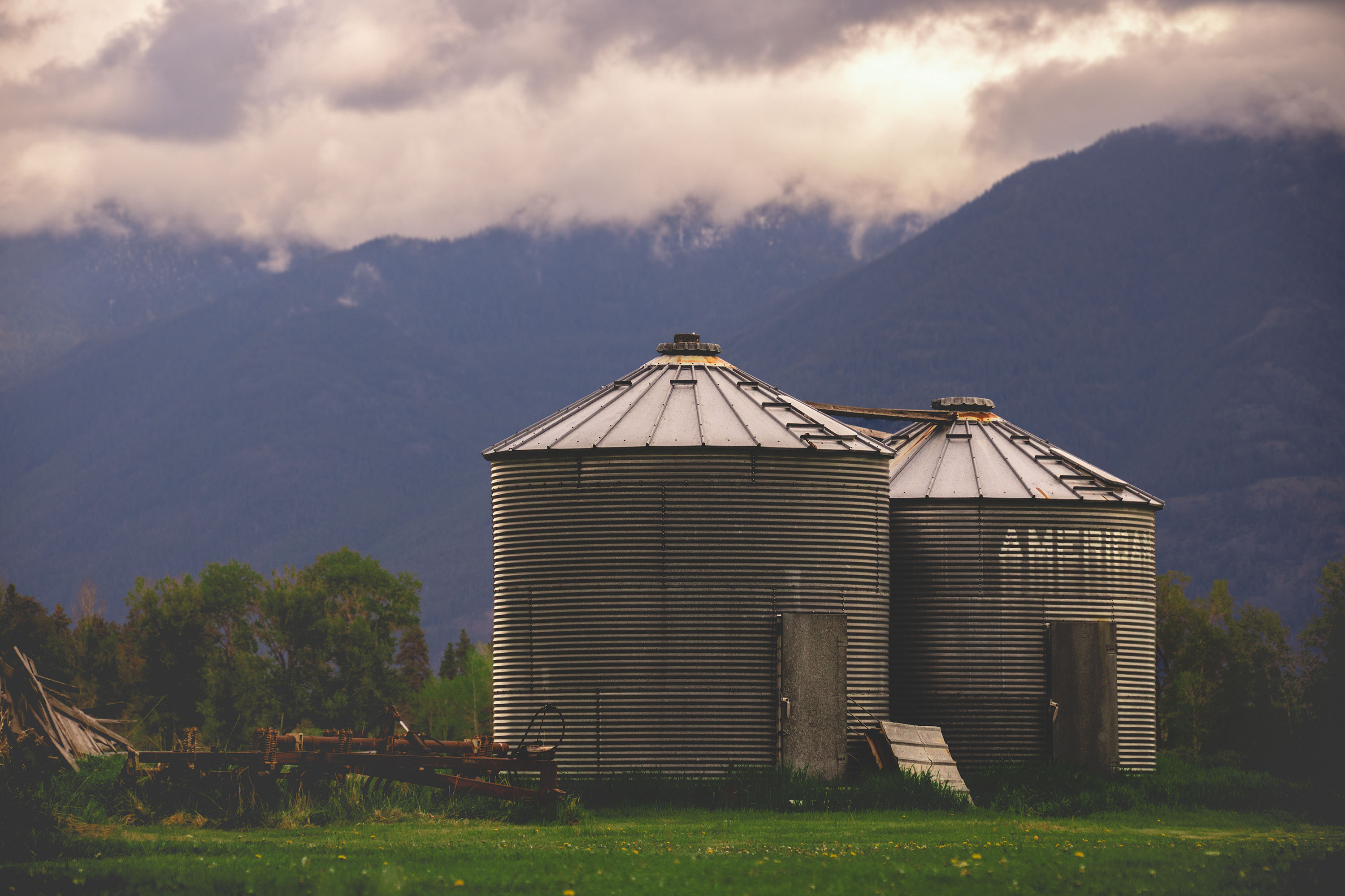 grain bins in field