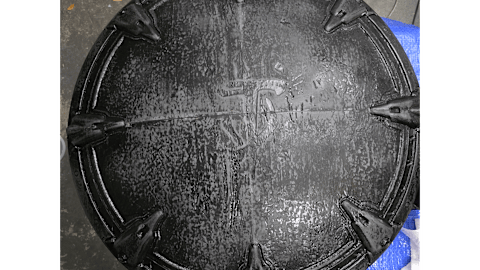 The front of the Shield Saw, primed with some drybrushing applied.