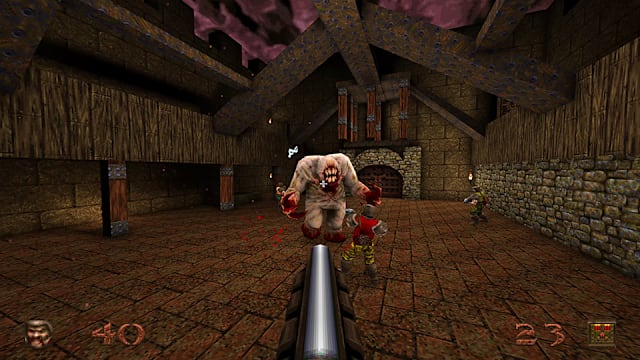 A Shambler monster faces the player during a Quake encounter