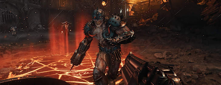 A fodder demon charges at the DOOM Slayer in a fiery combat scene.