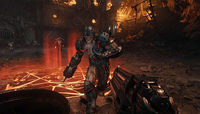 A fodder demon charges at the DOOM Slayer in a fiery combat scene.