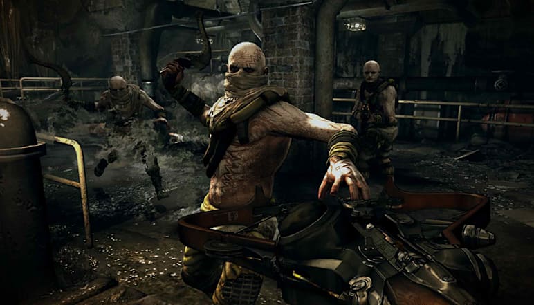 A fervent enemy takes a swing at the player during a battle in RAGE