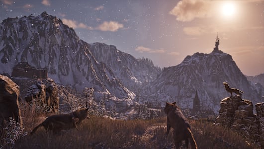 Lobos sobre uma formação rochosa uivam em meio a montanhas cobertas de neve.