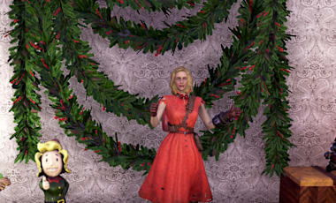 A female character is wearing a 50's style red dress. On the wall behind her sits a festive garland and on her left is a Christmas tree